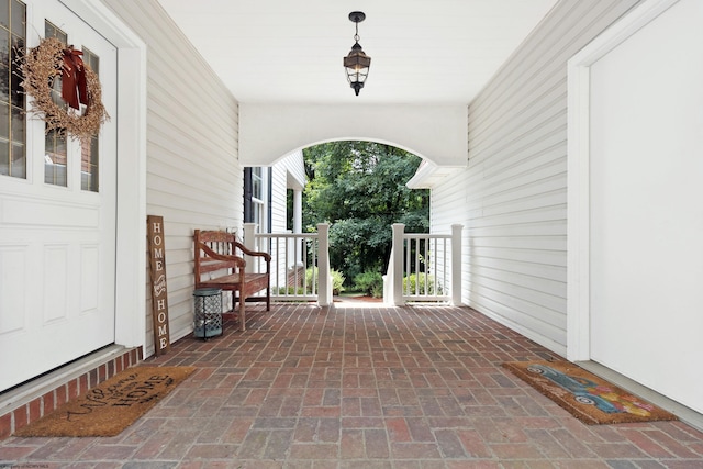 view of patio featuring a porch