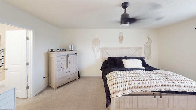 bedroom featuring light colored carpet and ceiling fan