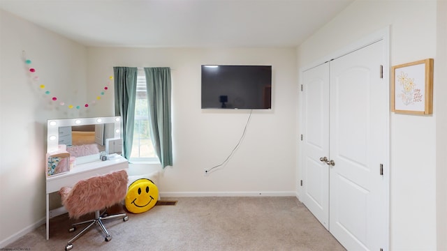 office space with light colored carpet