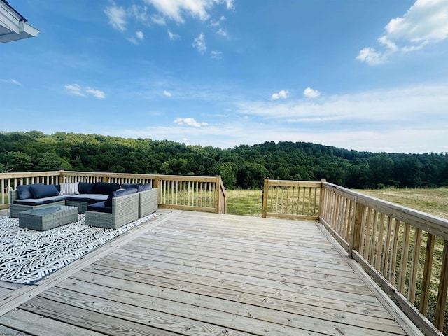 deck with an outdoor hangout area