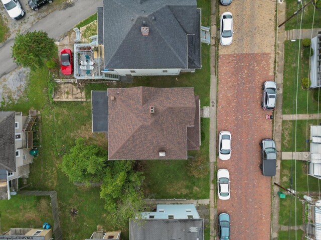 rear view of house featuring central air condition unit