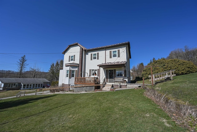 view of front of property featuring a front yard