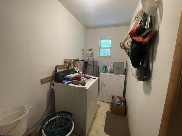 clothes washing area featuring laundry area and independent washer and dryer