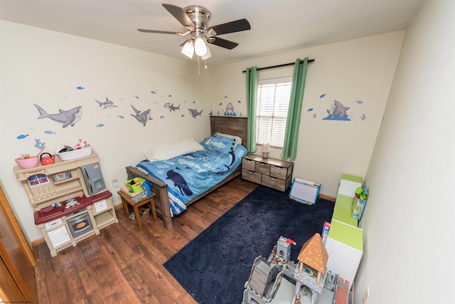 bedroom featuring dark wood-type flooring and ceiling fan