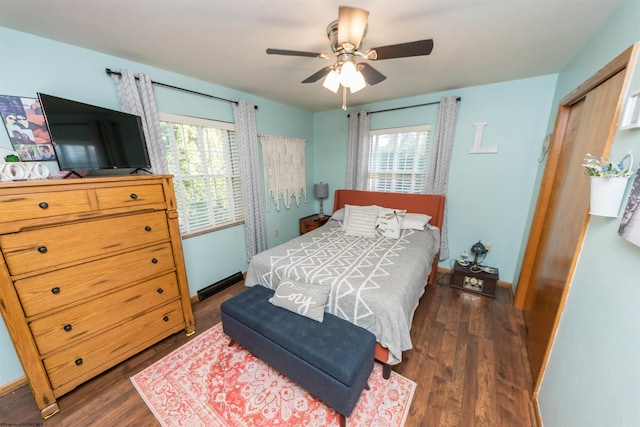 bedroom featuring dark wood-type flooring and ceiling fan