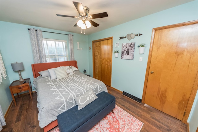 bedroom featuring dark hardwood / wood-style flooring, a closet, and ceiling fan