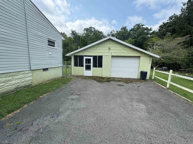 garage with a yard