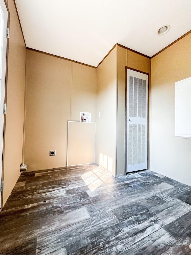 interior space featuring hardwood / wood-style flooring and ornamental molding