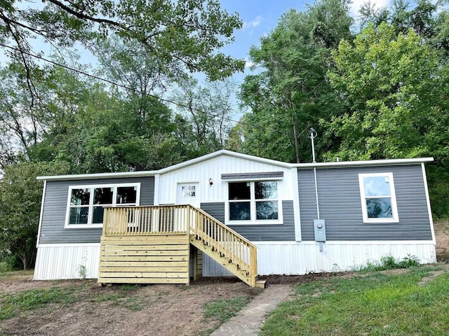 view of front facade featuring a wooden deck