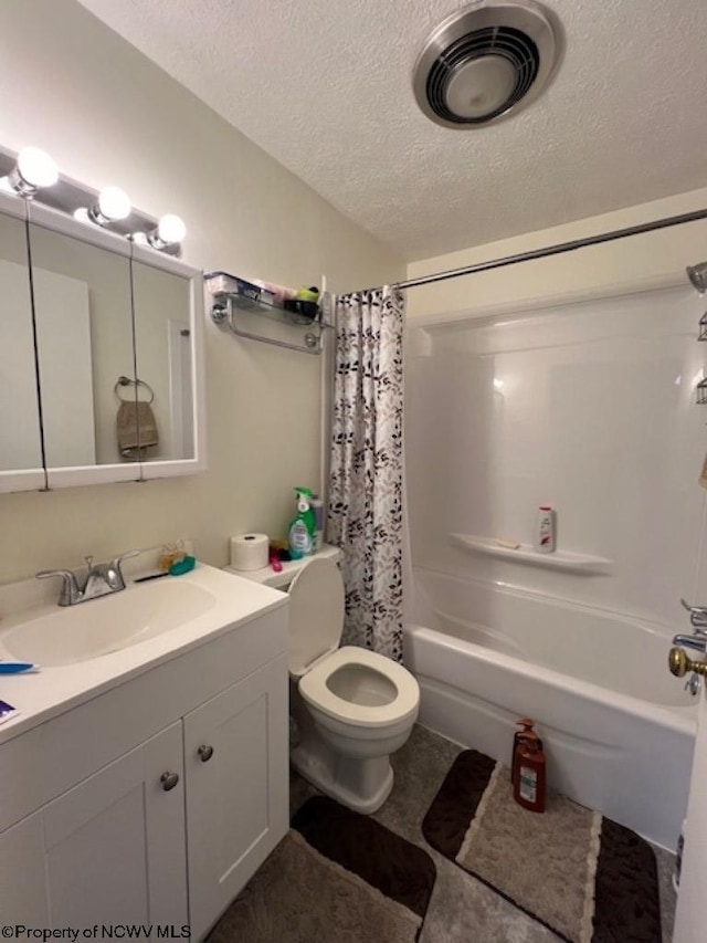 bathroom featuring shower / tub combo with curtain, visible vents, toilet, a textured ceiling, and vanity