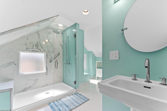 bathroom featuring sink, walk in shower, and tile patterned floors