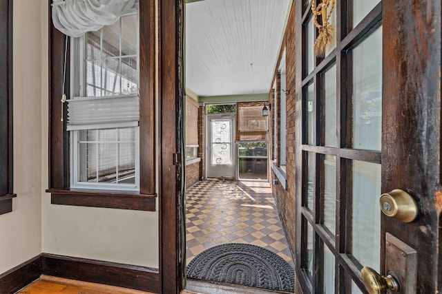 corridor with wood-type flooring