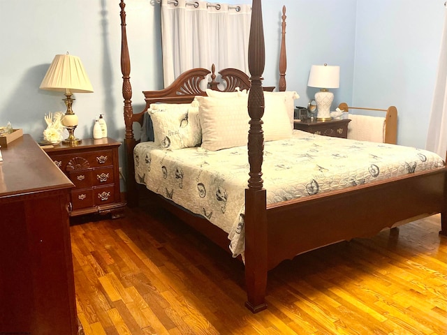 bedroom featuring hardwood / wood-style floors