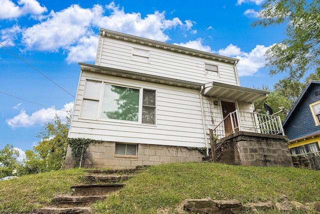 exterior space with a front yard