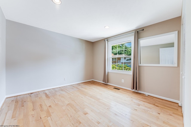 empty room featuring light wood-type flooring