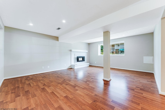 unfurnished living room with light hardwood / wood-style floors