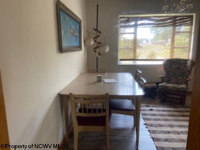 dining room with hardwood / wood-style floors