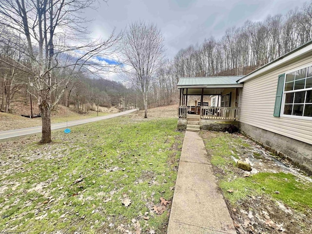 view of yard with a porch