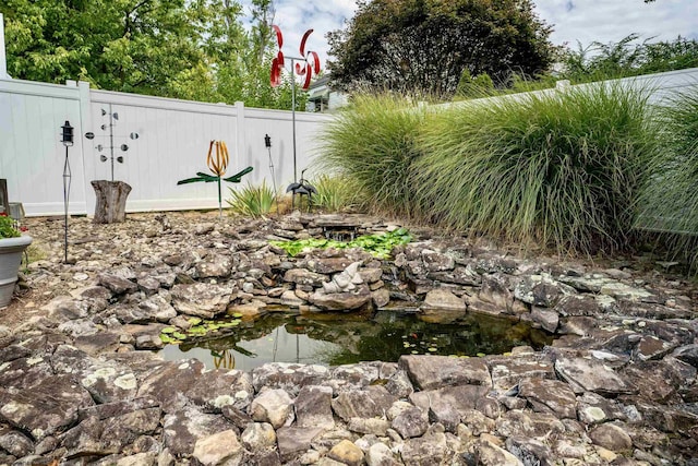 view of yard featuring fence