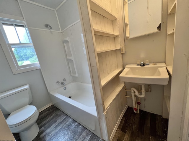 full bath featuring a sink, shower / bathtub combination, wood finished floors, and toilet