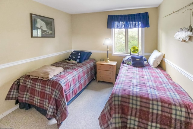 bedroom with light carpet
