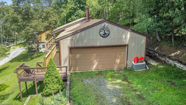 garage featuring a yard