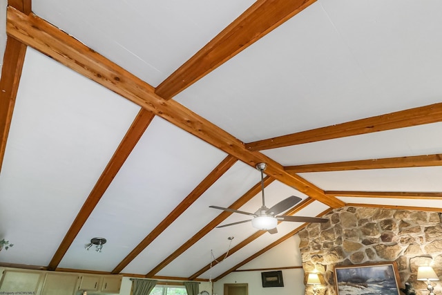 details with beamed ceiling, a stone fireplace, and ceiling fan