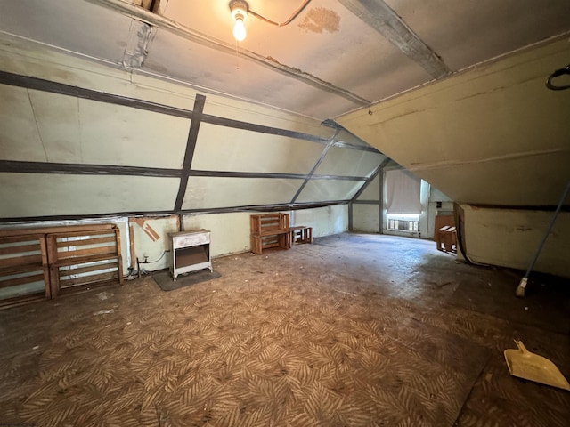 additional living space with vaulted ceiling