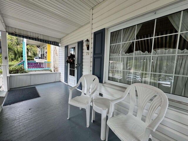 exterior space featuring covered porch