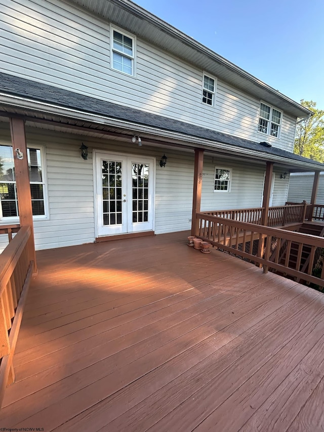 wooden deck featuring french doors