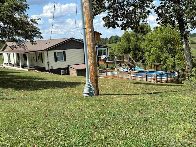 view of yard with a deck