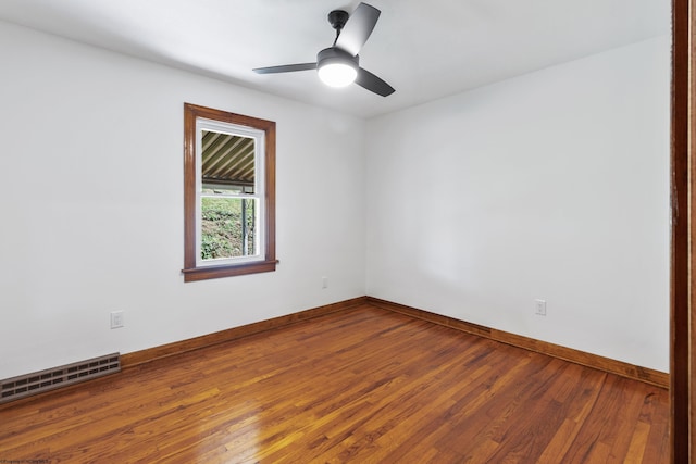 unfurnished room featuring ceiling fan and wood-type flooring