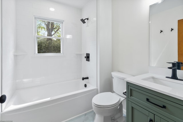 full bathroom featuring tile patterned floors, tiled shower / bath combo, vanity, and toilet