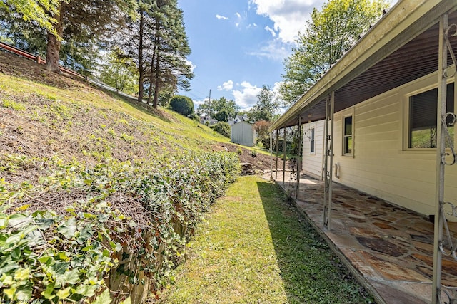 view of yard with a patio area