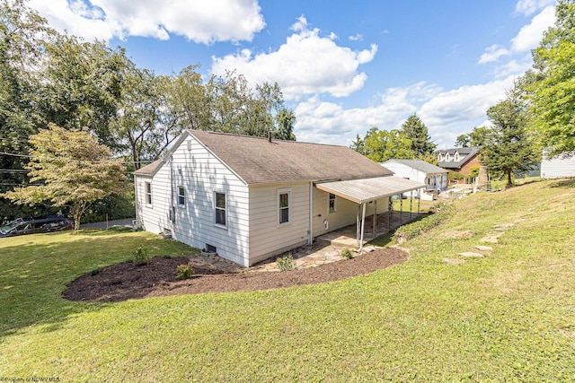 view of home's exterior with a yard