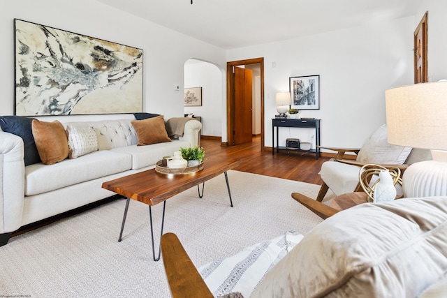 living room with dark hardwood / wood-style floors