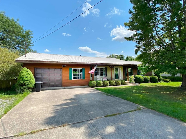 ranch-style house with a front lawn and a garage