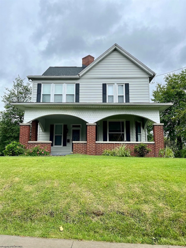 view of front of home with a front lawn