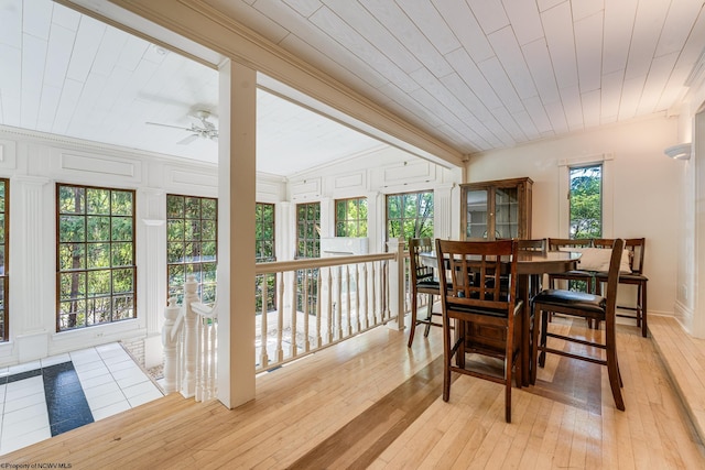 sunroom featuring ceiling fan