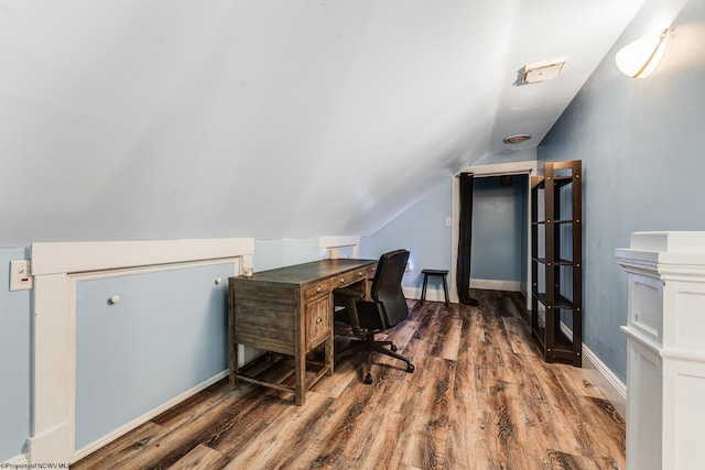 office area with vaulted ceiling and wood-type flooring