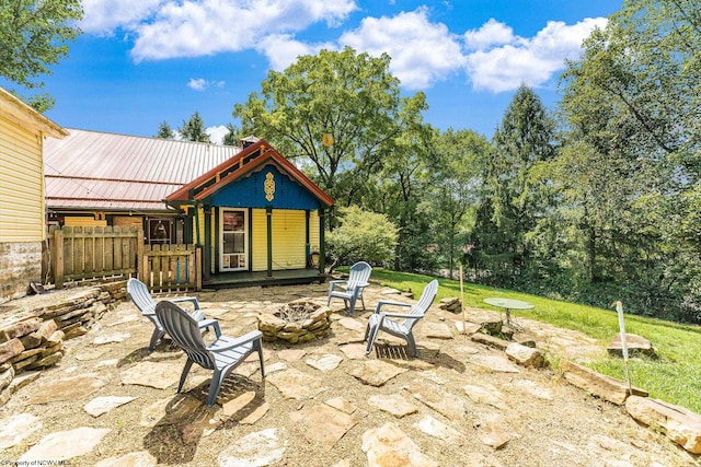 view of patio / terrace featuring a fire pit