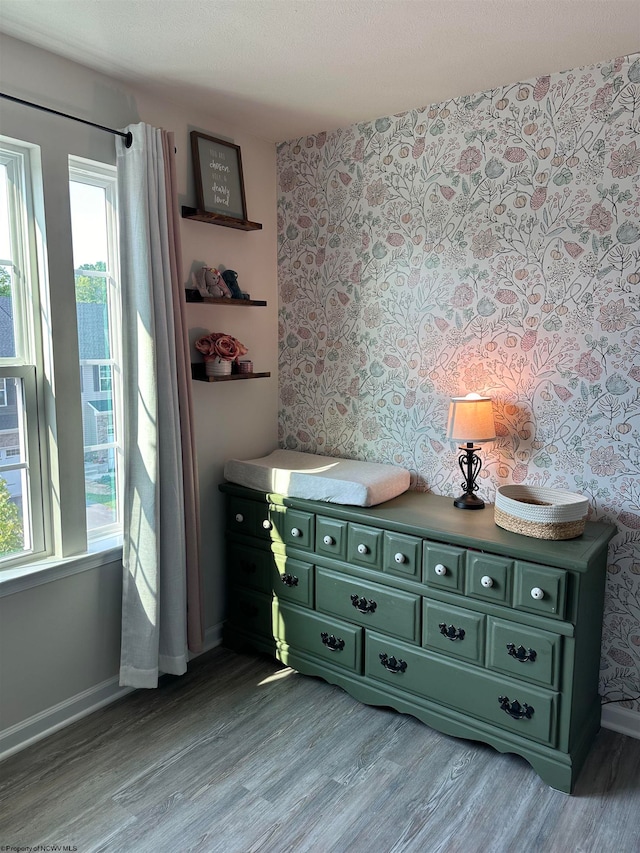 bedroom with wood-type flooring