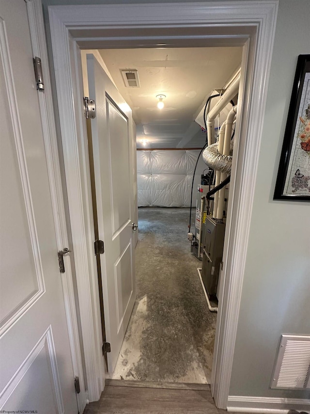 hallway featuring concrete flooring