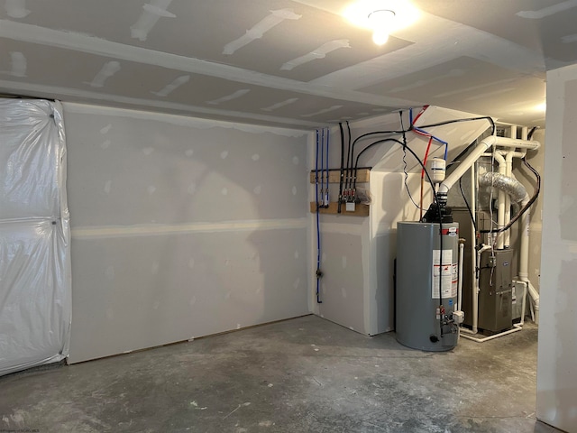 basement with heating unit and gas water heater