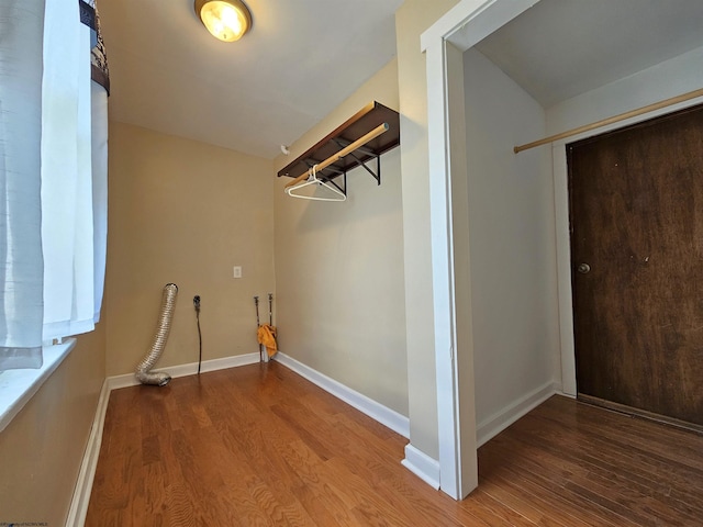 spacious closet featuring hardwood / wood-style floors