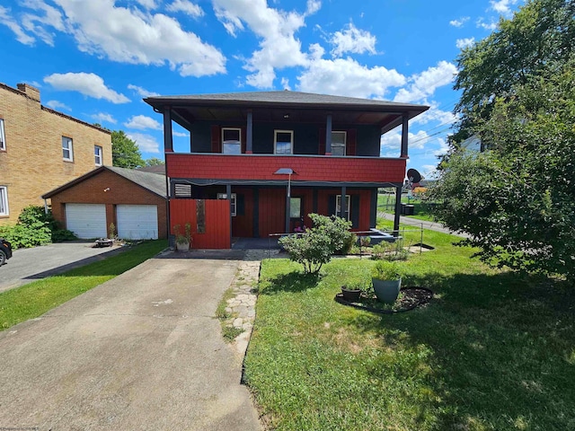 view of front facade featuring a front lawn and a balcony