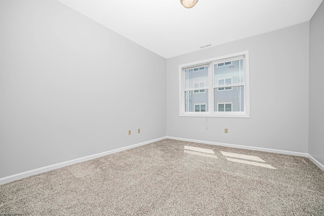 unfurnished room featuring carpet flooring