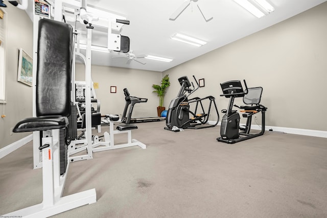 exercise room with ceiling fan