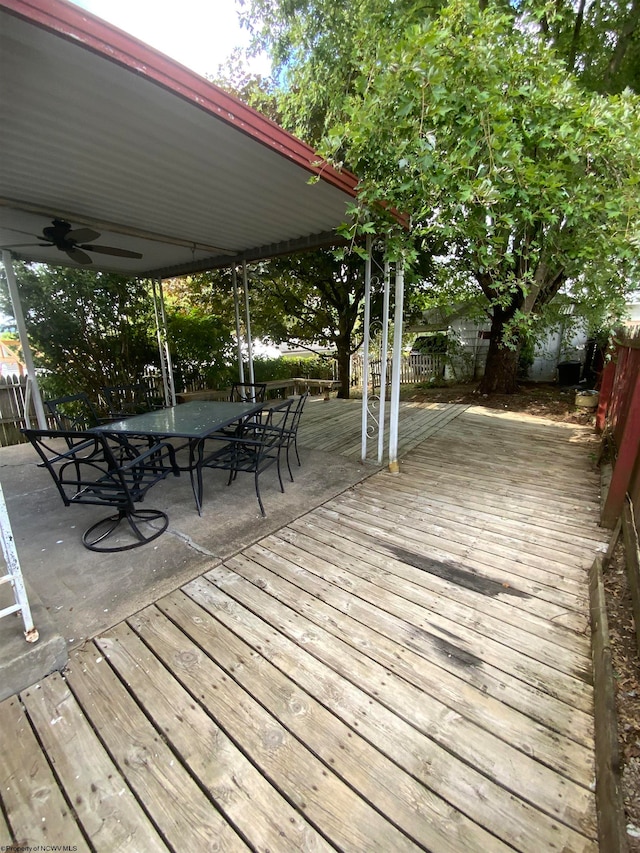 wooden deck with ceiling fan