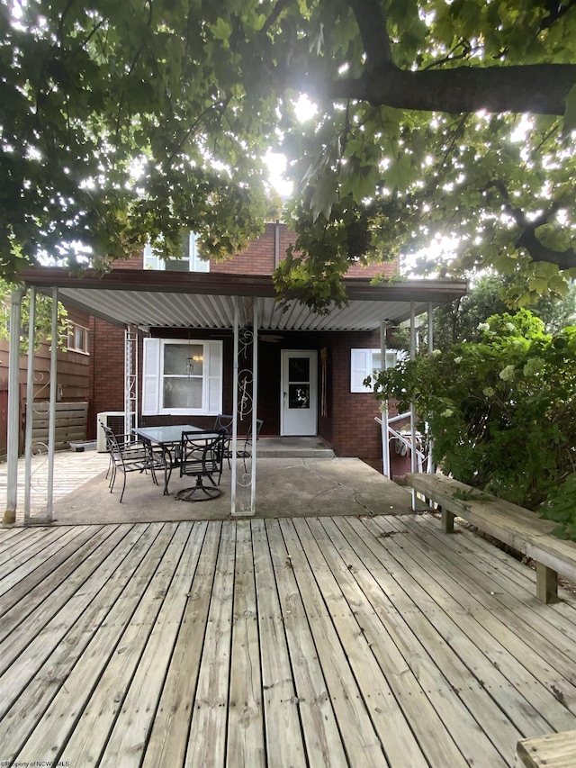 deck featuring outdoor dining space